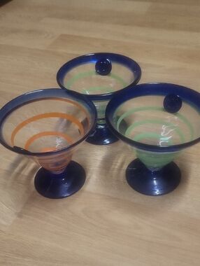 Kosta Boda Blue-Rimmed Martini Glasses with Green and Orange Spirals